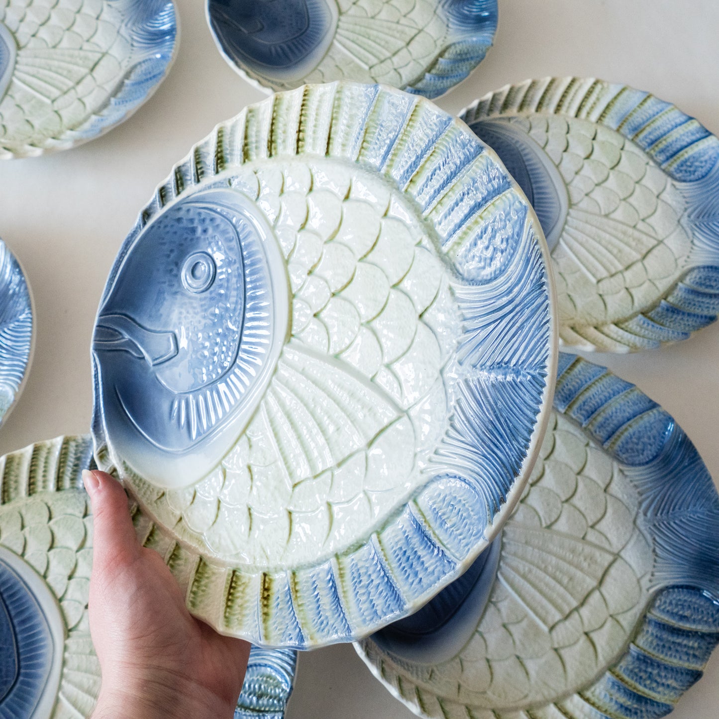 8 assiettes en barbotine poisson Sarreguemines