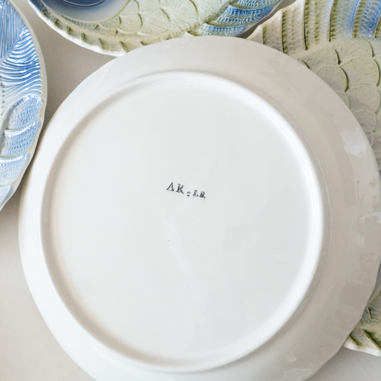 8 assiettes en barbotine poisson Sarreguemines