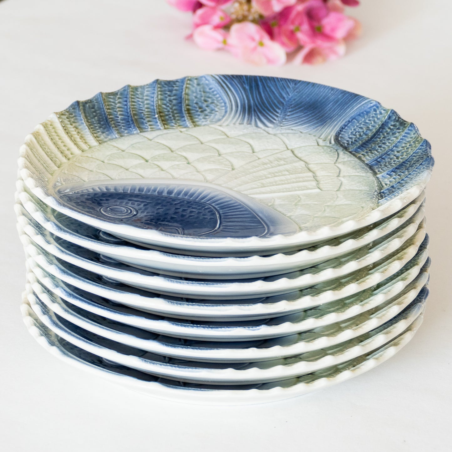 8 assiettes en barbotine poisson Sarreguemines