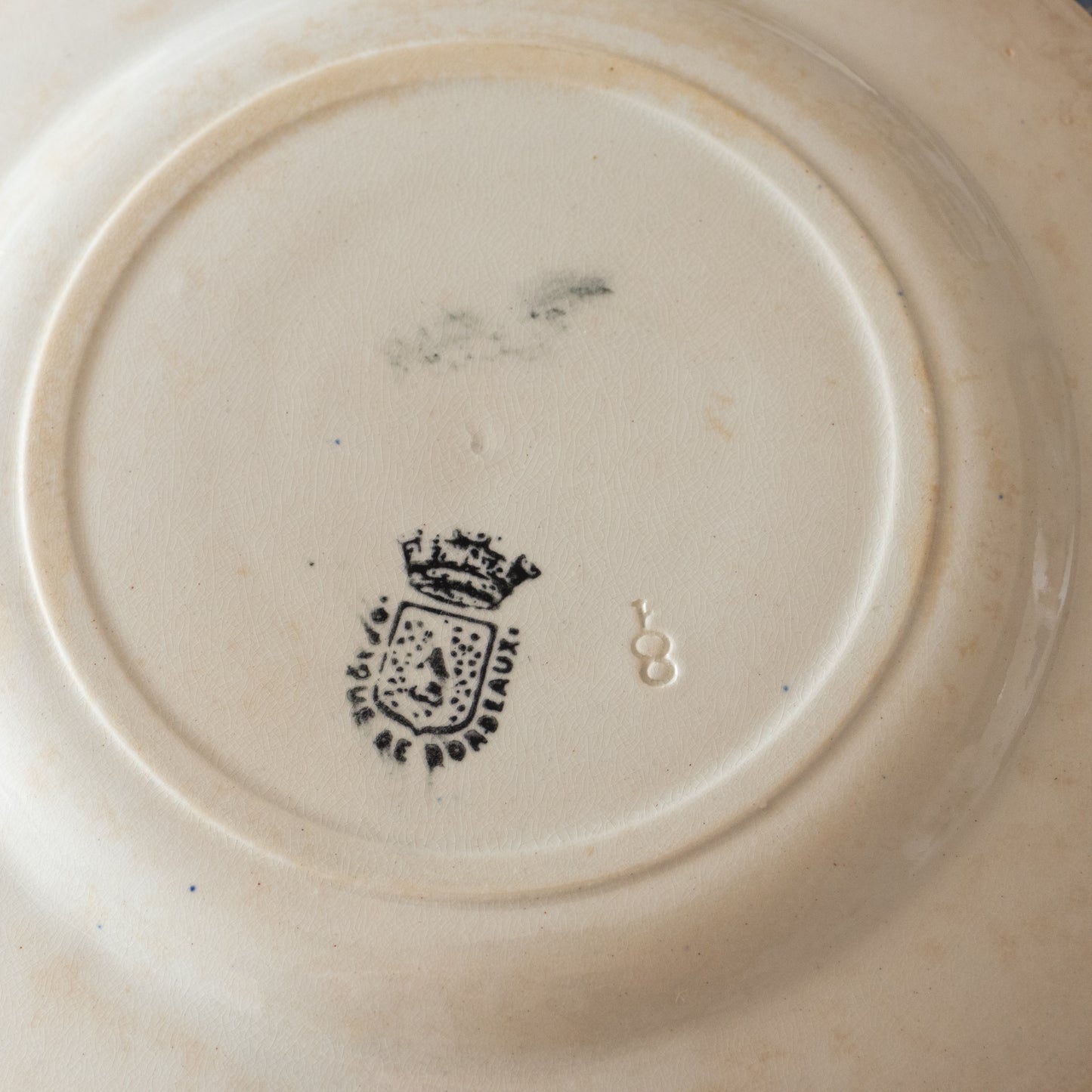 6 assiettes XIXe en porcelaine opaque de Bordeaux