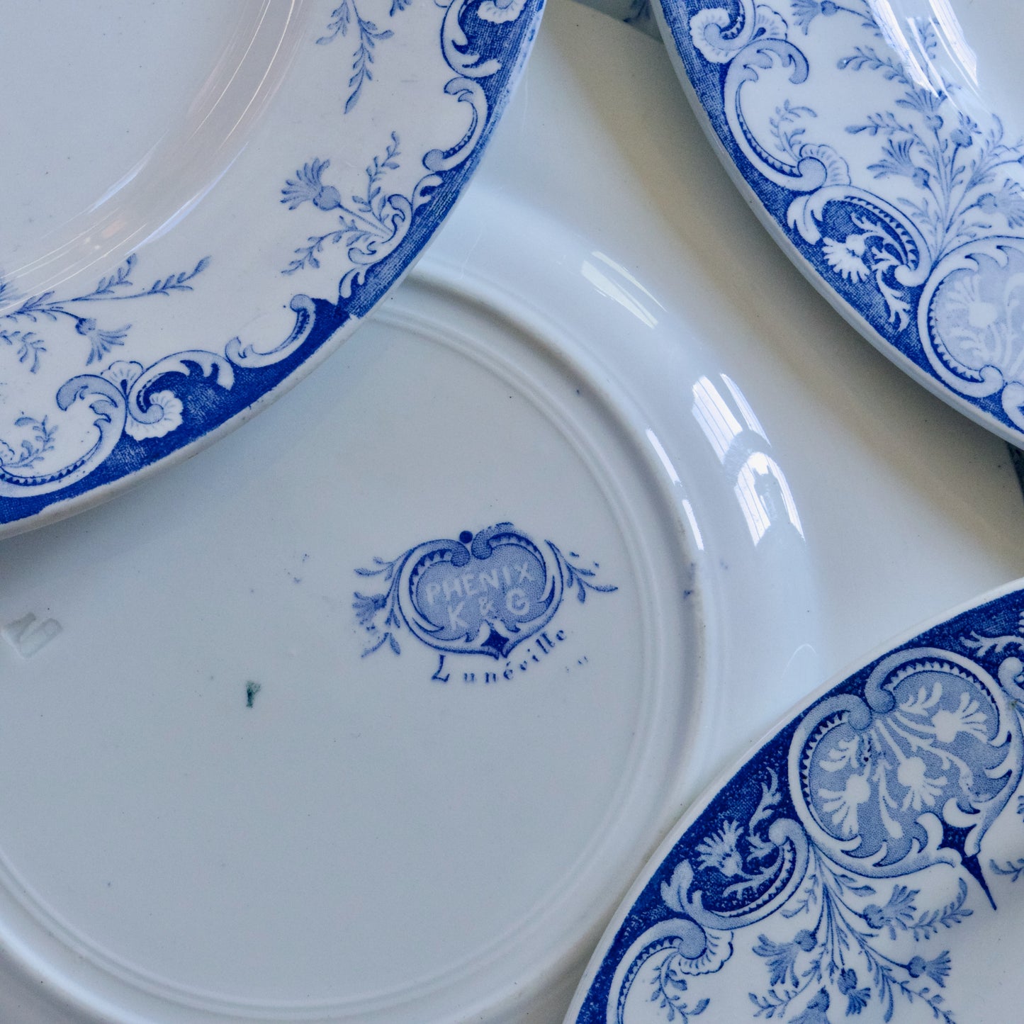 7 assiettes plates KG Luneville "Phénix" - terre de fer