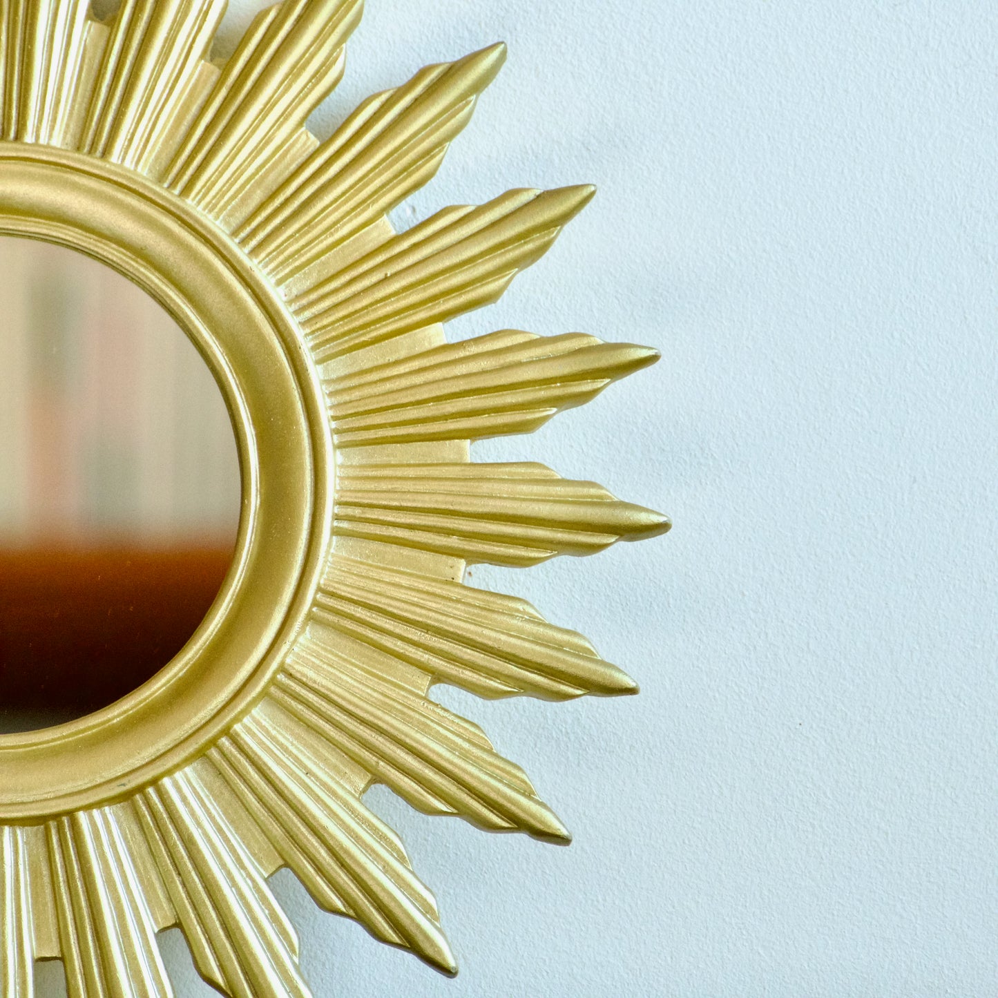 Miroir soleil vintage doré