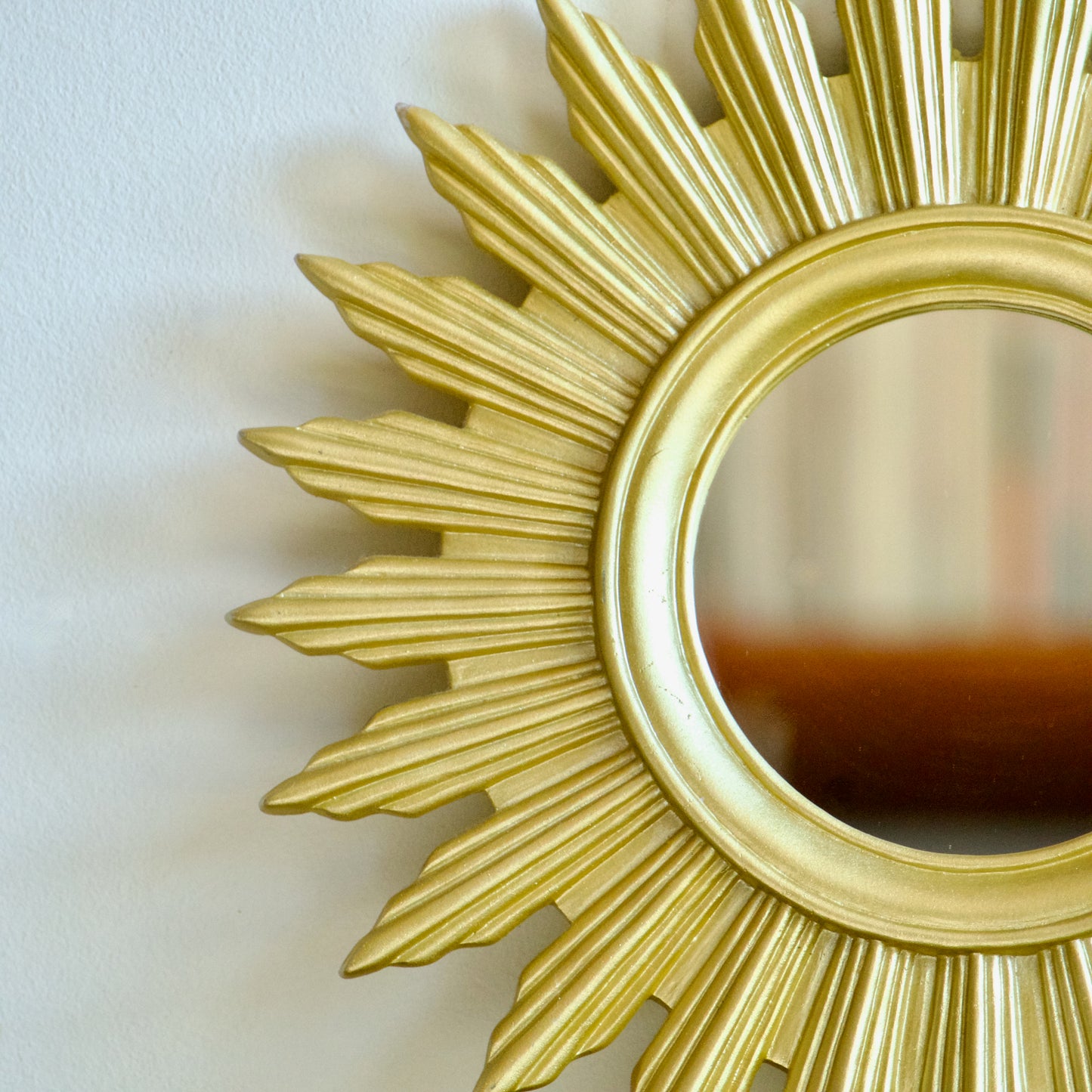 Miroir soleil vintage doré