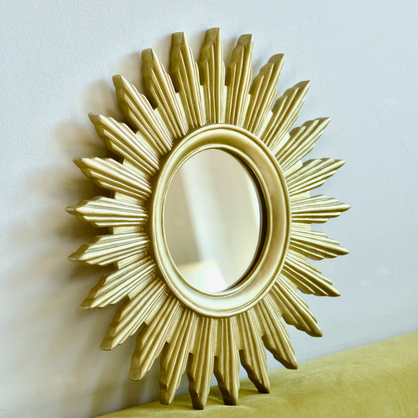 Miroir soleil vintage doré