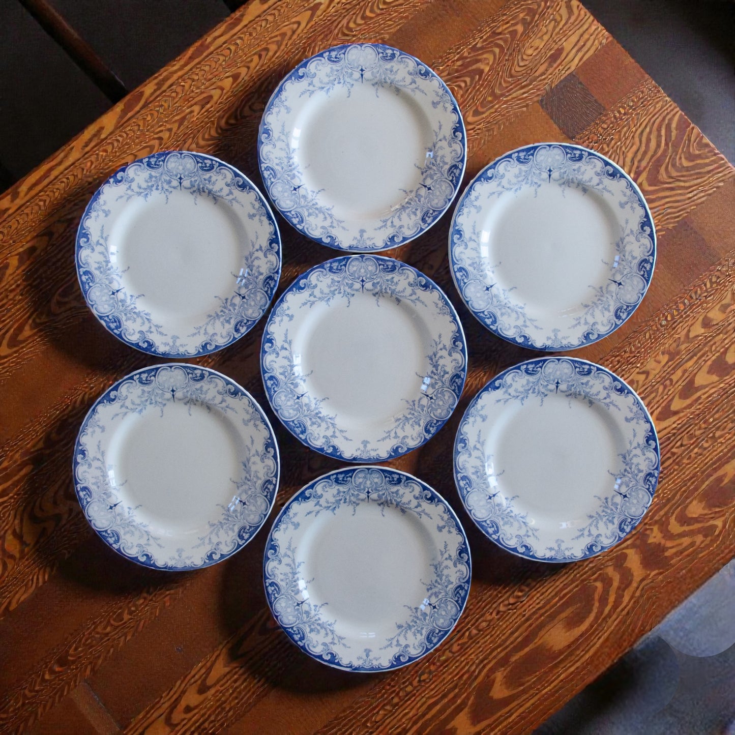 7 assiettes plates KG Luneville "Phénix" - terre de fer