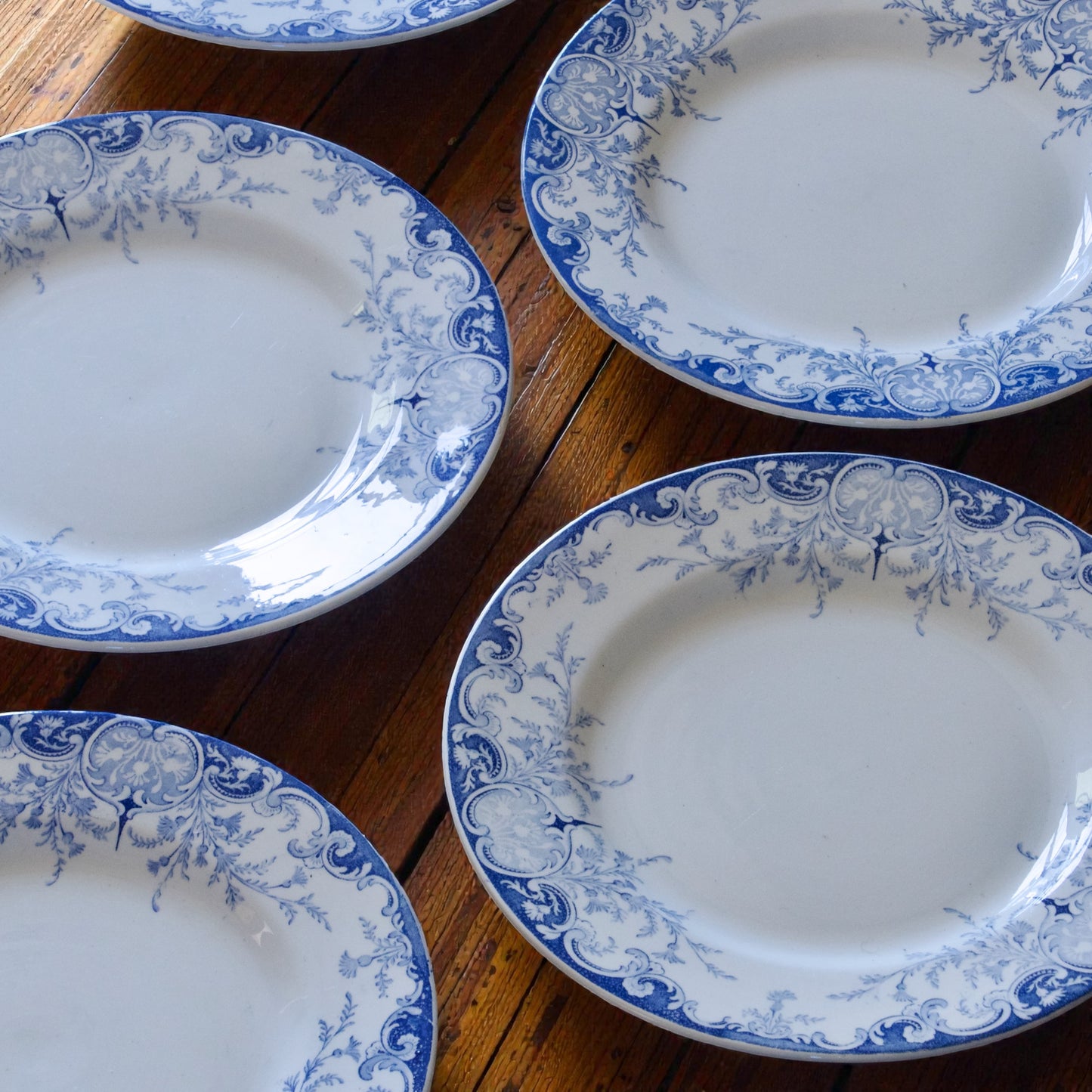 7 assiettes plates KG Luneville "Phénix" - terre de fer