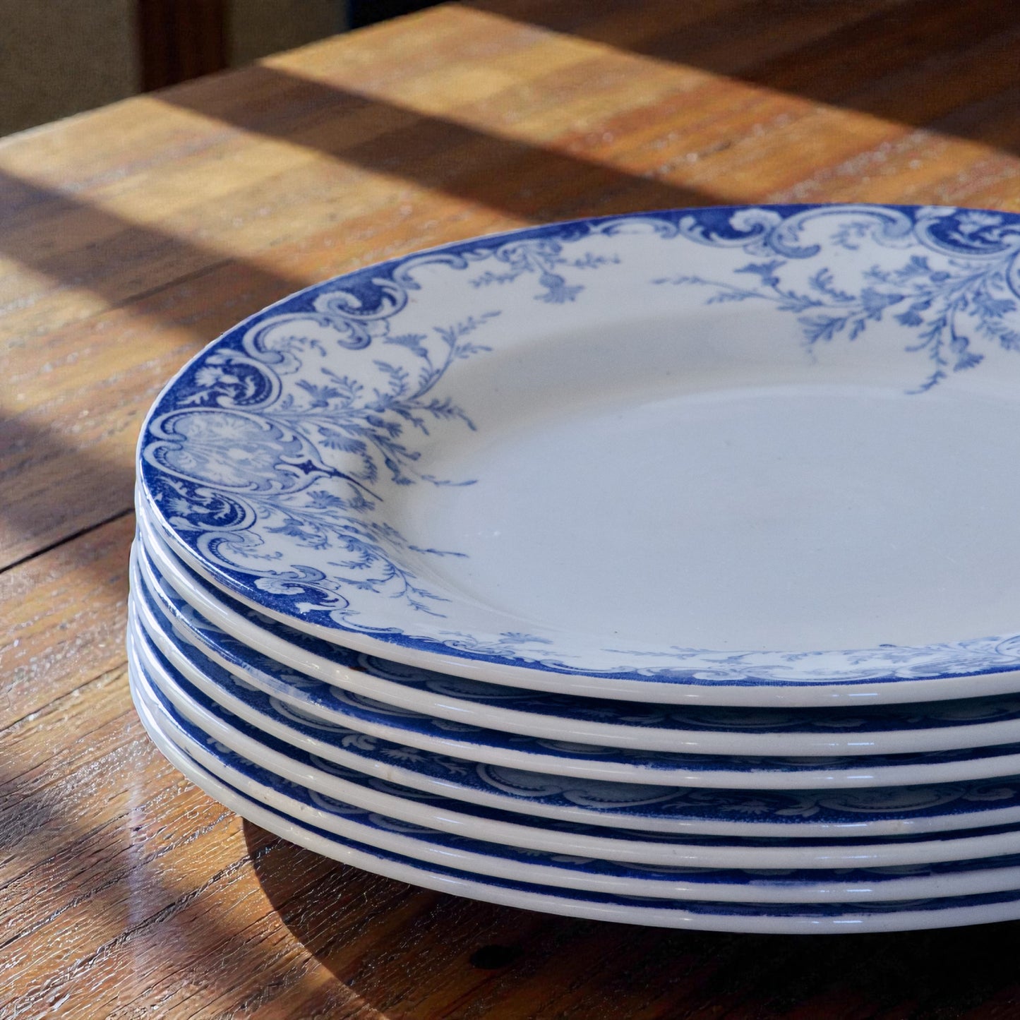 7 assiettes plates KG Luneville "Phénix" - terre de fer