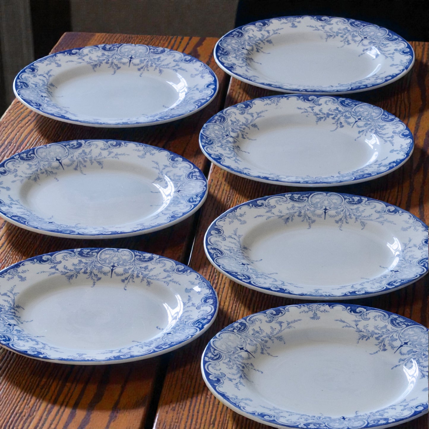 7 assiettes plates KG Luneville "Phénix" - terre de fer