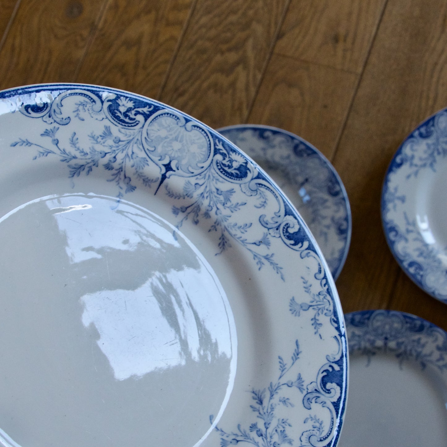 7 assiettes plates KG Luneville "Phénix" - terre de fer