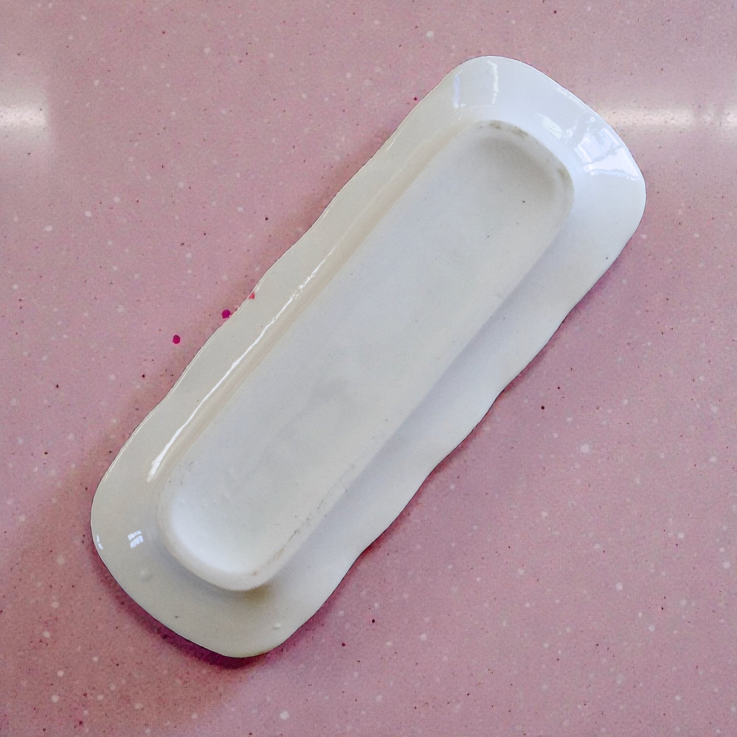 Porte-savon XIXe en terre de fer rose