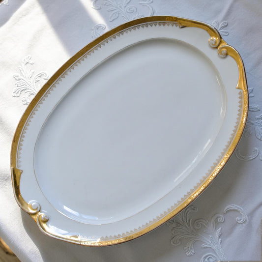 Très grand plat ovale en porcelaine de Limoges "Peconnet"