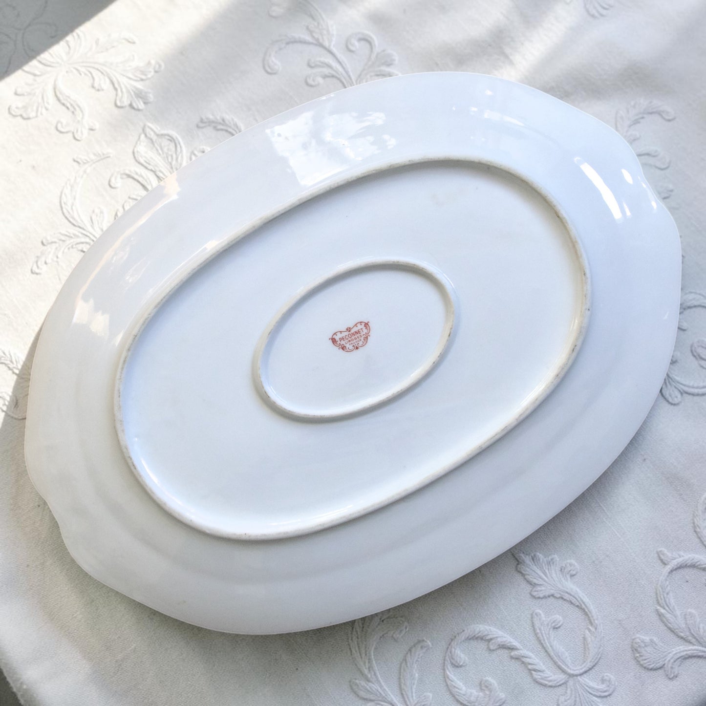 Très grand plat ovale en porcelaine de Limoges "Peconnet"