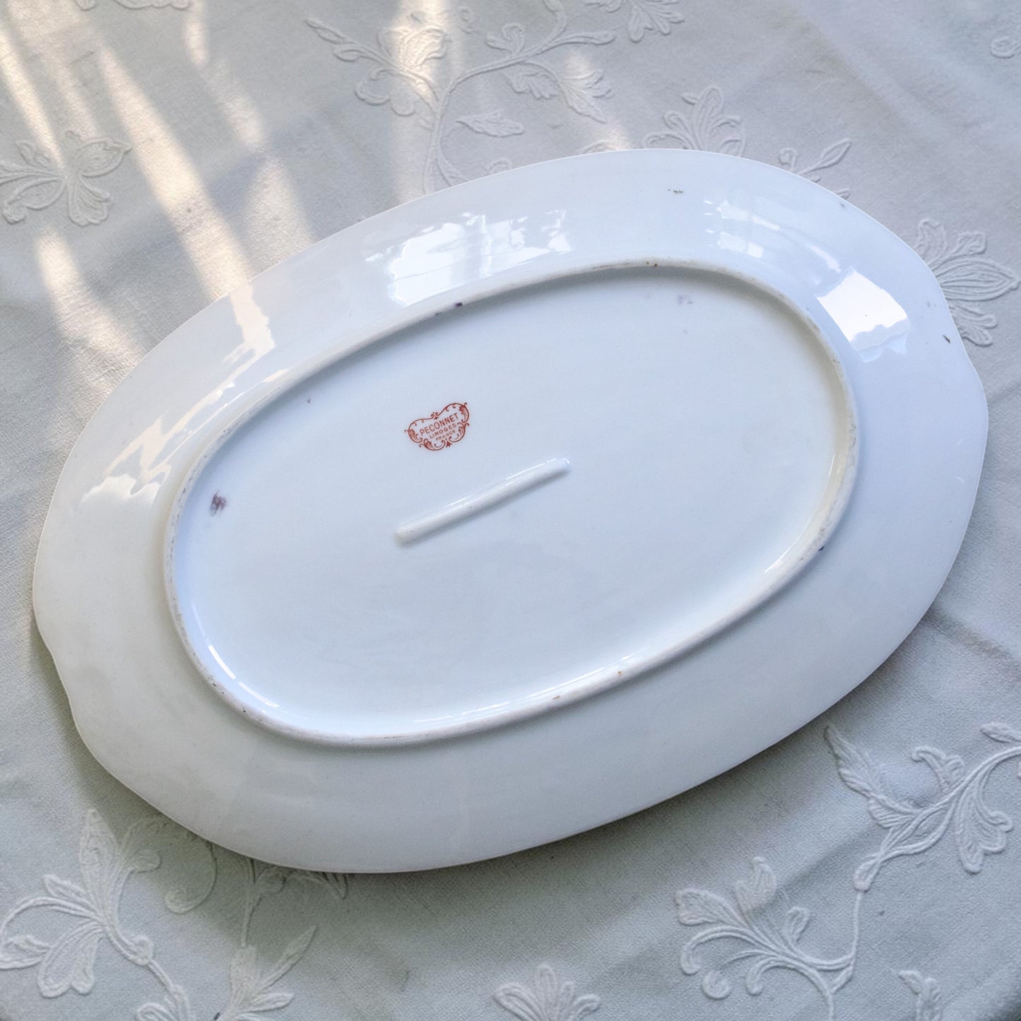 Grand plat ovale en porcelaine de Limoges "Peconnet"
