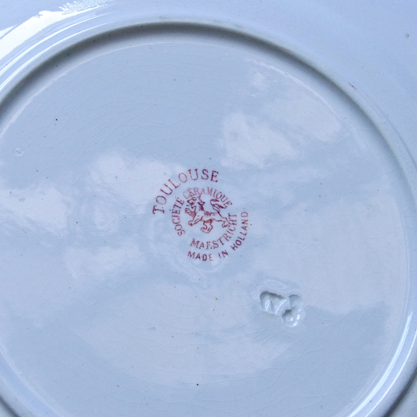 4 assiettes plates signées Maestricht collection "Toulouse" - terre de fer